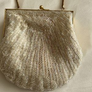 Vintage Ivory beaded clutch with goldtone metal